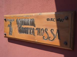 Insegna Osteria Grotta Rossa